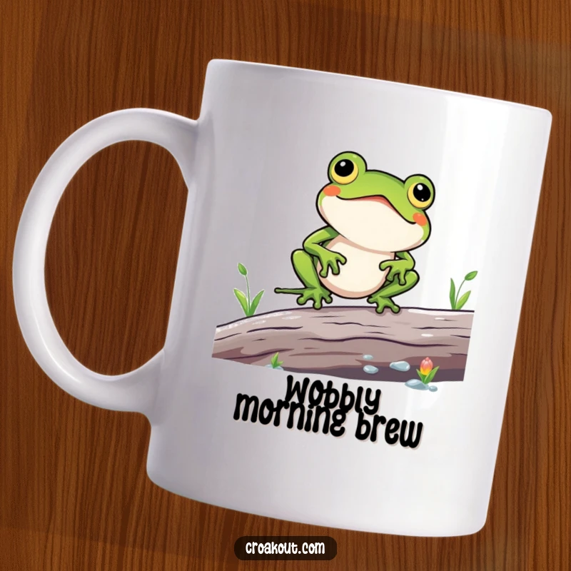 Funny mug featuring a cute kawaii frog character comically struggling to balance on a slippery log, looking distressed, near water.