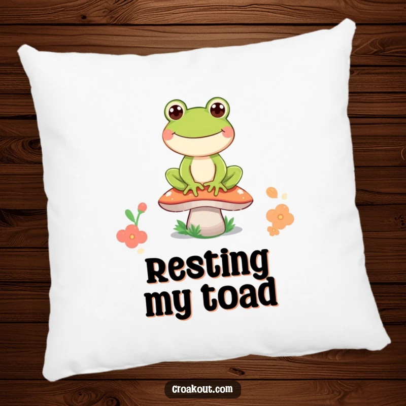 Funny frog pillow featuring a happy frog character sitting on a mushroom, its wide, joyful grin bringing comfort and playful energy.