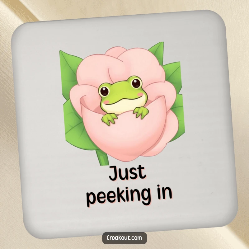 Funny Frog Coaster: A decorative coaster featuring a charming frog peeking from behind a flower, protecting surfaces with a touch of humor.