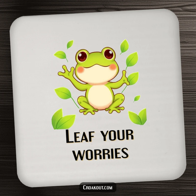 Funny kawaii frog coaster depicting a cute amphibian happily juggling bright green leaves, a humorous and protective accessory.