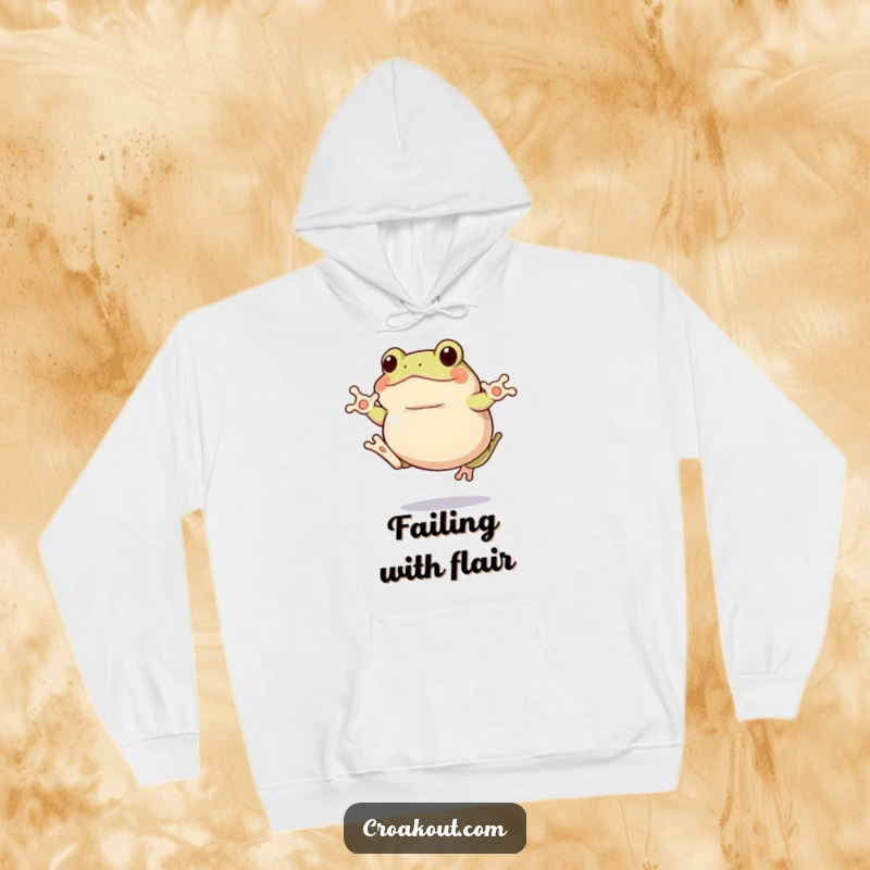 Funny clumsy frog hoodie showing a plump amphibian mid-jump with hilarious awkwardness, a cozy funny gift.