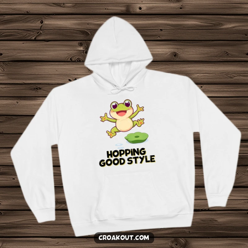 Funny frog hoodie depicting a happy amphibian mid-jump over a lily pad, showcasing a joyful and funny gift.