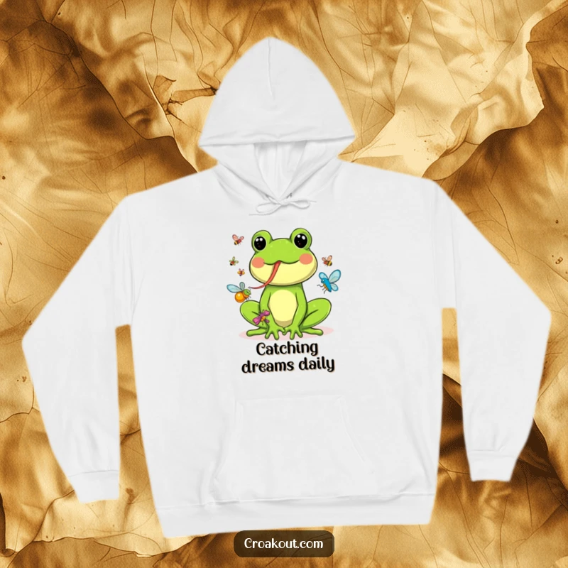 Funny hoodie depicting a joyful frog using its long, sticky tongue to snatch colorful flying insects, illustrating a humorous chase.