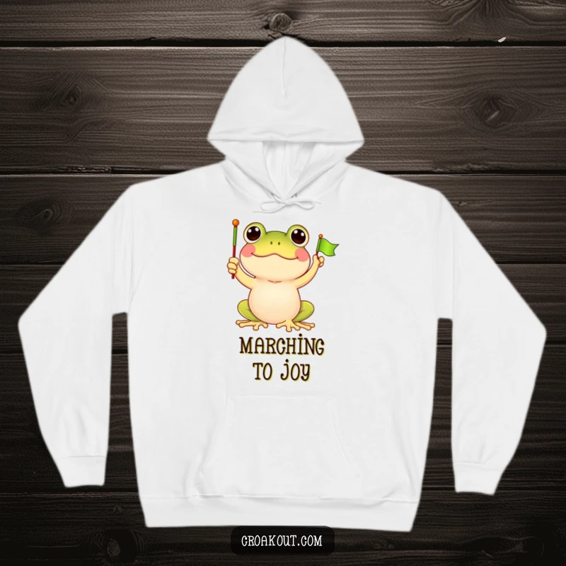 Funny frog hoodie featuring a jubilant frog character waving a small flag, perfect for cozying up while celebrating good vibes.