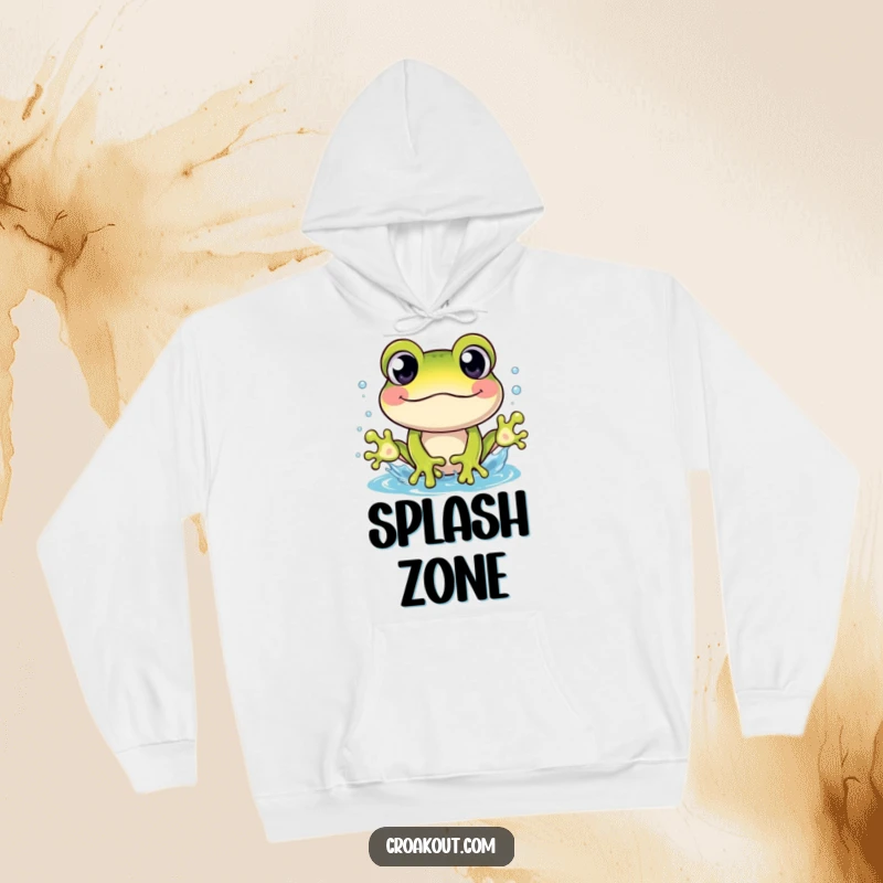 Funny hoodie showing a cheerful frog character with wide eyes, caught in a dynamic splash, perfect for quirky comfort.