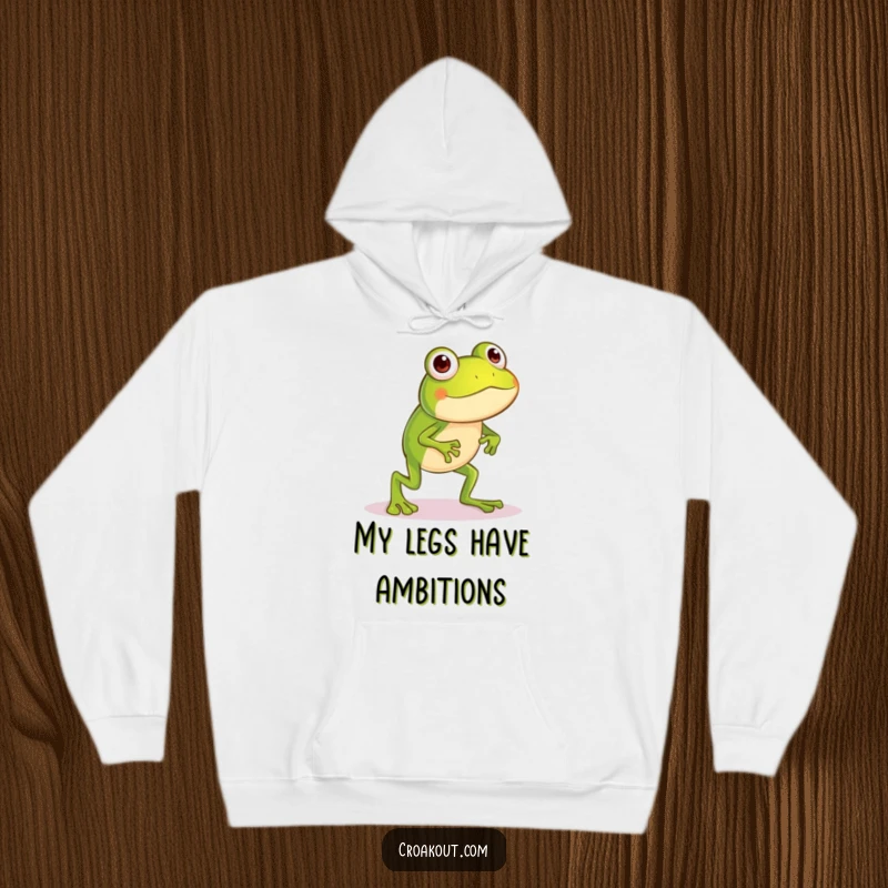 Funny frog hoodie with a little character sporting long legs, captured in a silly hop, providing cozy humor and warmth.