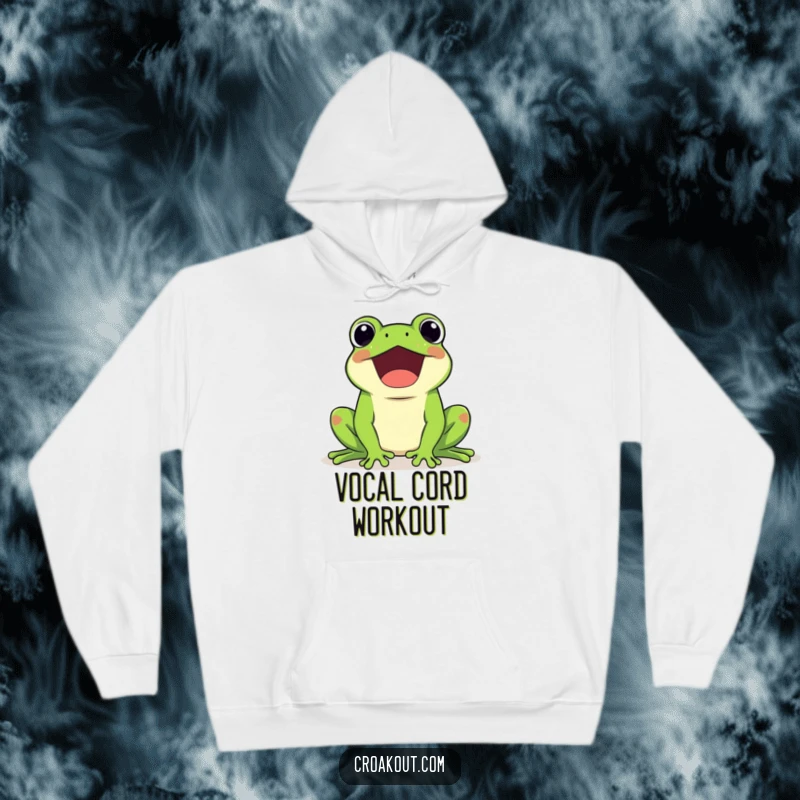Funny hoodie showing a kawaii frog character happily croaking loudly, cozy and warm, for amphibian lovers.