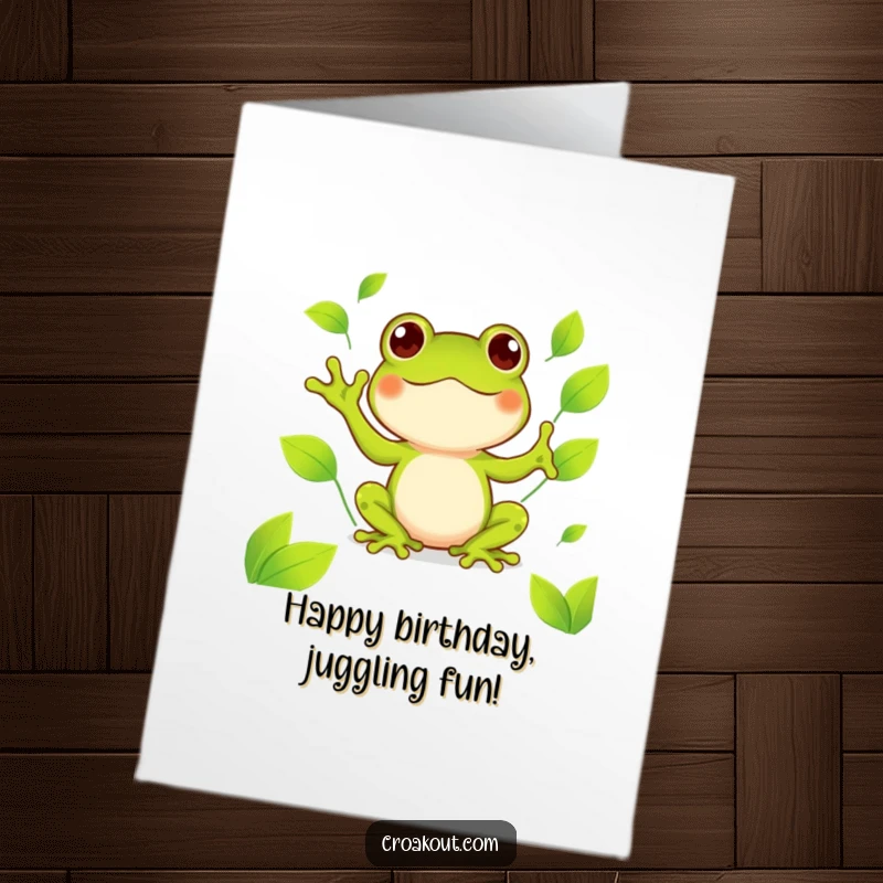 Funny Free Printable Birthday Card featuring a cute Kawaii frog happily juggling bright green leaves with a smile.