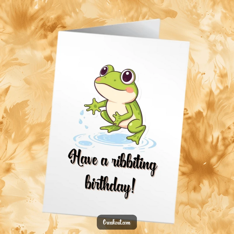 Funny Free Printable Birthday Card: A joyful frog mid-leap, playfully jumping over tiny, sparkling water droplets, celebrating another year with fun.