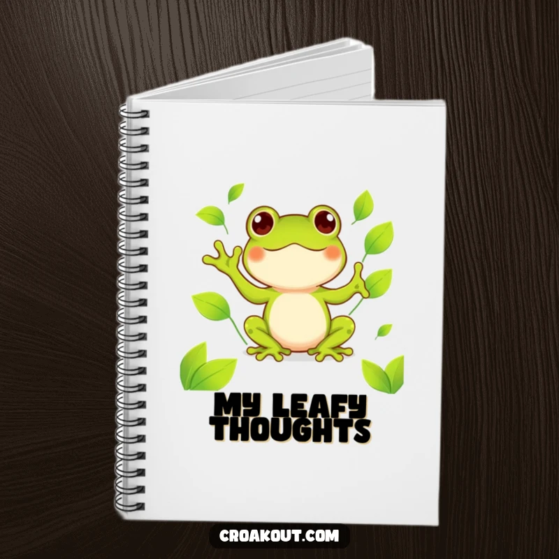 Funny kawaii frog notebook showing a cute amphibian happily juggling bright green leaves, perfect for jotting down happy thoughts.