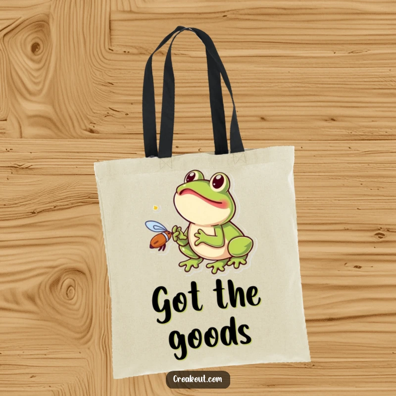 Funny frog tote bag featuring a small amphibian excitedly catching a fly with its tongue, a humorous and practical carry-all.