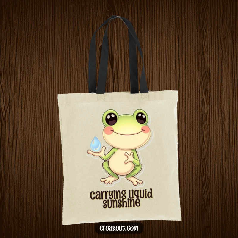 Funny Frog Tote Bag: A cute tote bag featuring a frog holding a shiny dewdrop, symbolizing joy and appreciation for small wonders.